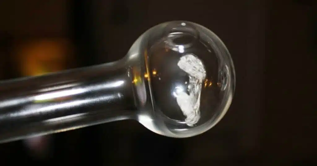 up close image of a glass meth pipe bowl