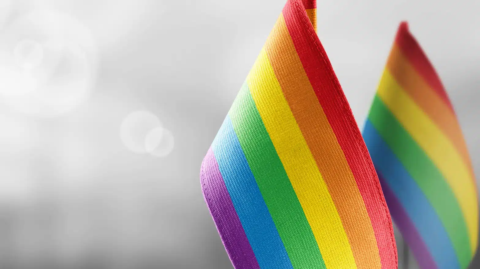 Two pride flags - LGBTQ+ Group Therapy For Mental Health Disorders