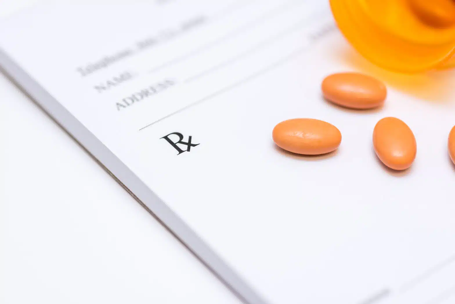 A prescription pad with pills on it - 9 Obvious Signs Of Doctor Shopping